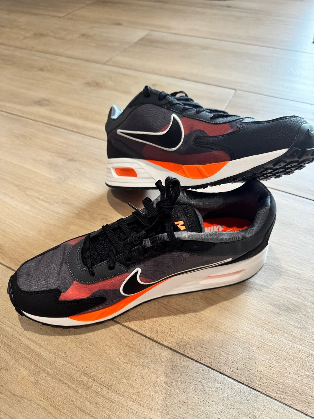 Nike Men’s Black and Orange Low-Top Sneakers